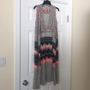 Love on a hanger mid length sleeveless sweater